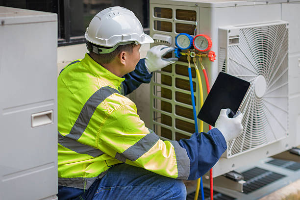Professional Emergency Ac Repair technician working in Cortland, NY